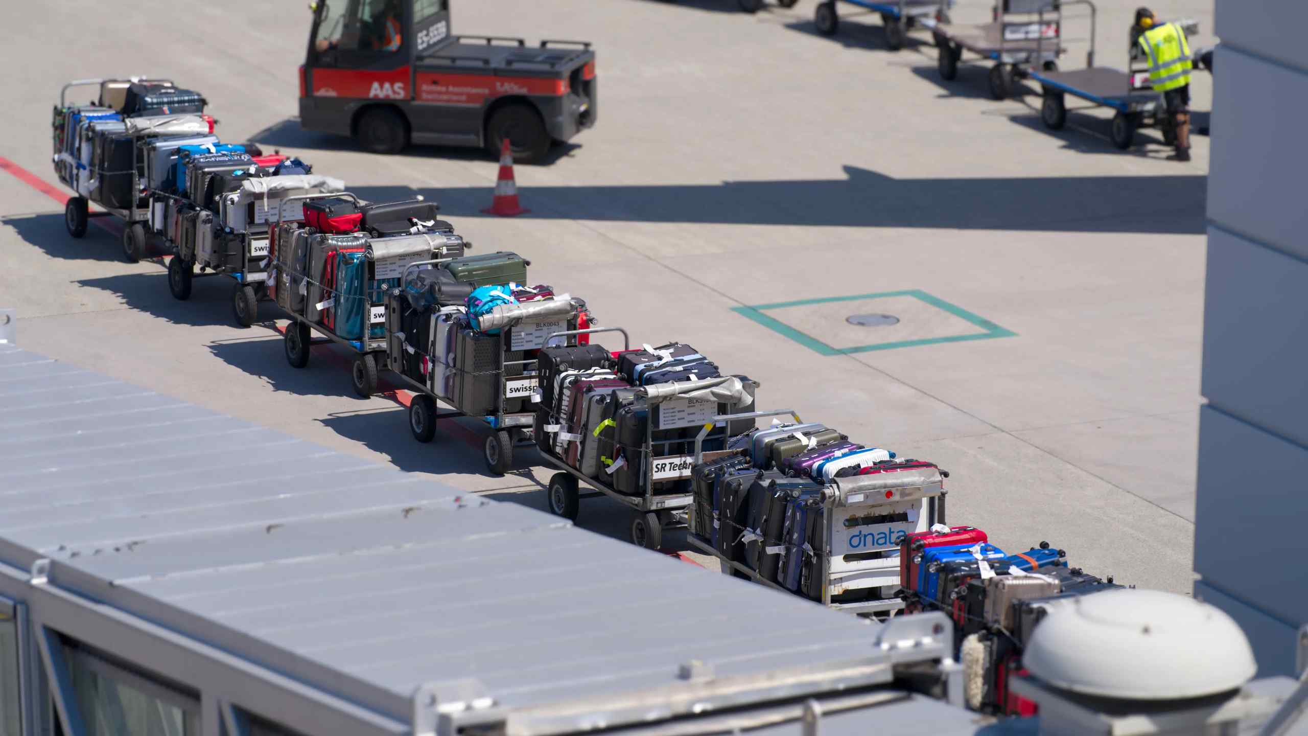 Luggage being transported at the airport.
